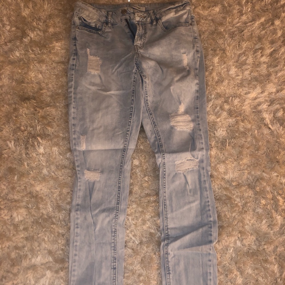Distressed refuge jeans